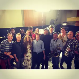 Lady Gaga and Paul McCartney and his group in the recording studio