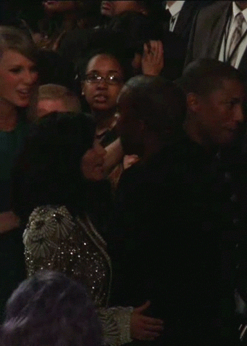Taylor Swift and Kanye West hug each other at 57th Grammy Awards